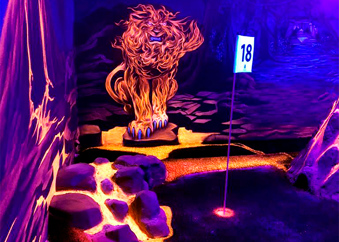 Fire lion in blacklight at adventure golf